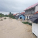 Kondisi Perumahan Graha Desa Kranji saat diterjang banjir bandang.