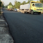 Jalan nasional Majyen Bambang Yuwono, Singkalan, Sidoarjo kini mulus. Pihak berwenang memastikan jalur nasional tuntas saat lebaran. Foto: YUDI EP/BANGSAONLINE