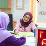 Petugas dari Kementerian ATR/BPN saat melayani masyarakat. 