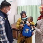 Salah satu balita yang baru saja menjalani operasi bibir sumbing secara gratis di Rumah Sakit Ketapang, Kabupaten Sampang.