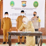 Penandatanganan MoU antara Pemkot Pasuruan melalui Dispendukcapil, Pengadilan Agama Kota Pasuruan, dan Polres Pasuruan Kota terkait pelayanan publik.