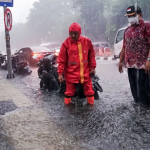 Ilustrasi hujan di Surabaya