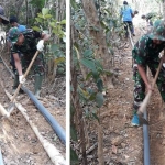 Anggota Satgas TMMD Kodim 0828/Sampang saat membantu perbaikan pipanisasi.