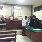 Saiful Ilah saat menjalani sidang tipikor.