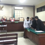 Saiful Ilah saat menjalani sidang tipikor.