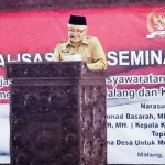  H. Sanusi Plt Bupati Malang saat sambutan.