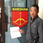 Korban usai melapor ke Bareskrim Polres Sidoarjo.