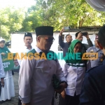 Rombongan dari DPC PKB Ngawi saat mendaftar ke KPU. Foto: ZAINAL ABIDIN/BANGSAONLINE