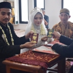 Agung Setyo Nugroho dan Syahidah Hani