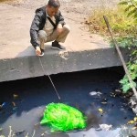 Korban mulitasi yang berada tas plasti berwana hijau di Trosobo, Sidoarjo.