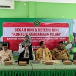 Hj. Umi Kulsum saat memberi pemaparan dalam rakor