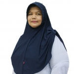 Dr. Ria Angin, M.Si.