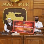 Menteri Hukum dan HAM Yasonna H Laoly menyerahkan bantuan sosial berupa 1.000 paket sembako dan alat kesehatan buatan narapidana kepada Pemprov Jatim. Penyerahan bantuan itu diselenggarakan melalui sambungan teleconference. foto: istimewa