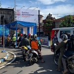 Suasana saat vaksinasi drive thru di Satlantas Polres Batu.