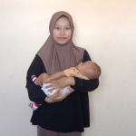 Ocky Silvia Sulistyani bersama buah hatinya. (Ist). 