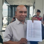 Koordinator GKS Basra, Taufik, saat berada di Kejari Situbondo.