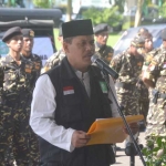 Ketua PCNU Pacitan, H. Mahmud pada acara penyerahan bantuan korban bencana alam. foto: ist