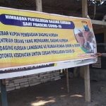 Salah satu banner imbauan penyaluran daging kurban secara door to door. (foto: ist).