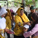 Hiruk pikuk kegiatan Posyandu di Desa Kedungsalam, Kecamatan Donomulyo, Kab. Malang.