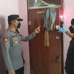 Polisi melakukan olah TKP di lokasi kejadian.