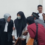 Terdakwa Retnowati Wulandari (35) saat memasuki ruang sidang. Foto: Ist.
