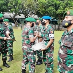 Dandim 0826/Pamekasan Letkol Inf Ubaydillah memimpin pelepasan satuan atau tradisi Korps Raport pindah dan masuk satuan kodim 0826 yang berlangsung di lapangan Makodim 0826 Pamekasan.