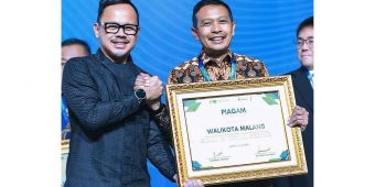 Komitmen Kembangkan BUMD Air Minum, Pemkot Malang Raih Penghargaan di IWWEF 2025