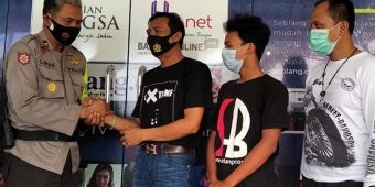 Oknum Polisi yang Menghalangi Wartawan Ambil Gambar Saat Unjuk Rasa di Banyuwangi Meminta Maaf