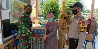 Babinsa Petahunan Dampingi Penyaluran Bantuan Bagi Pelaku Usaha Wisata Terdampak Covid-19