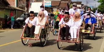 Diusung 7 Parpol, ​Paslon Arifin-Syah Daftar ke KPU Naik Becak