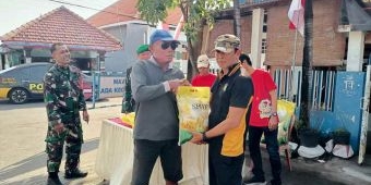 Polsek Buduran Bersama Koramil Distribusikan Beras SPHP Melalui Program GPM