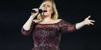Tulis Surat, Adele tak akan Tur Dunia Lagi?