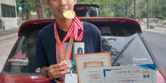 Putra Ketua Aliansi Jurnalis Pasuruan Bersatu Sabet Medali Emas dalam Olimpiade JSO Nasional
