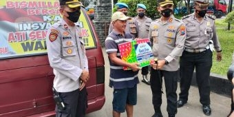 Bantu Ringankan Beban Masyarakat Dampak Penyesuaian BBM, Polres Pasuruan Gelar Baksos di 2 Titik