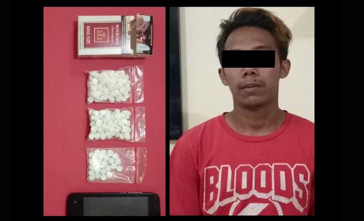 Tersangka Singgih Prasetyo dan barang bukti.