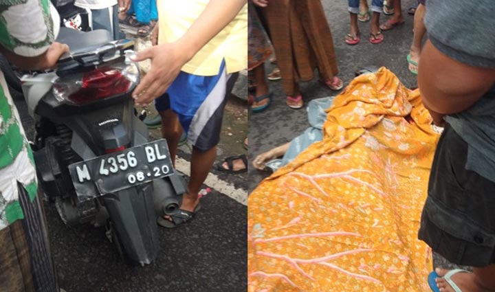 Sepeda motor korban dan korban yang sudah ditutupi kain oleh warga setempat.