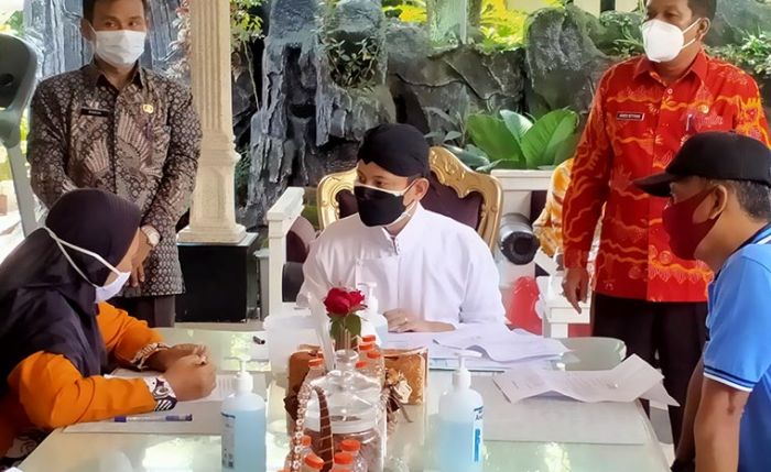  Pengundian Kios Pasar Pon, Ratusan Pedagang Tanda Tangan Pakta Integritas di Hadapan Bupati