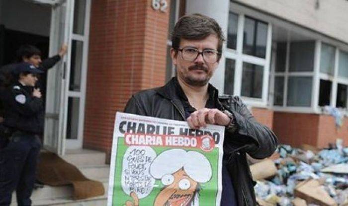 Usai Menggambar Nabi Muhammad, Kartunis Charlie Hebdo Menangis Usai Menggambar Nabi Muhammad, Kartunis Charlie Hebdo Menangis
