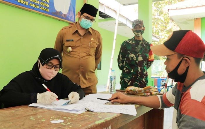 Plt Wali Kota Pasuruan Kawal Penyerahan BST Kemensos Plt Wali Kota Pasuruan Kawal Penyerahan BST Kemensos