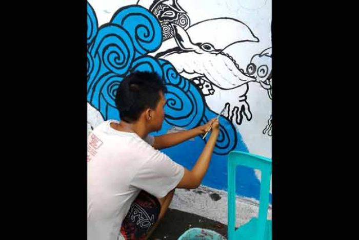 Komunitas Mural Bahu-Membahu Percantik Pulau Santen Banyuwangi