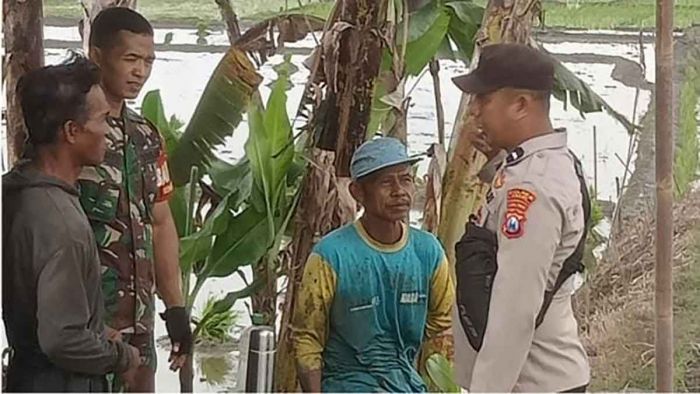 Maraknya Jebakan Tikus Listrik, Babinsa Dan Bhabinkamtibmas Bringin Ngawi Berikan Imbauan ke Petani