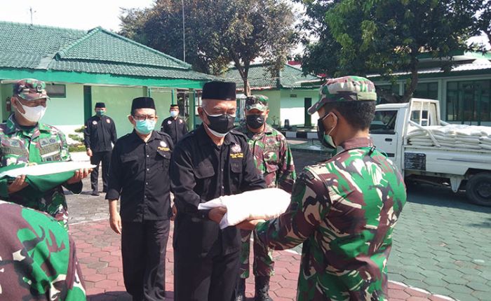 Bantu Warga Terdampak Pandemi, IPSI dan PSHT Cabang Ngawi Salurkan Bantuan Beras