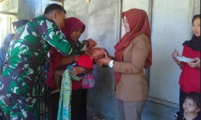 Satgas TMMD Bantu Petugas Posyandu Pantau Tumbuh Kembang Balita di Nitri Satgas TMMD Bantu Petugas Posyandu Pantau Tumbuh Kembang Balita di Nitri
