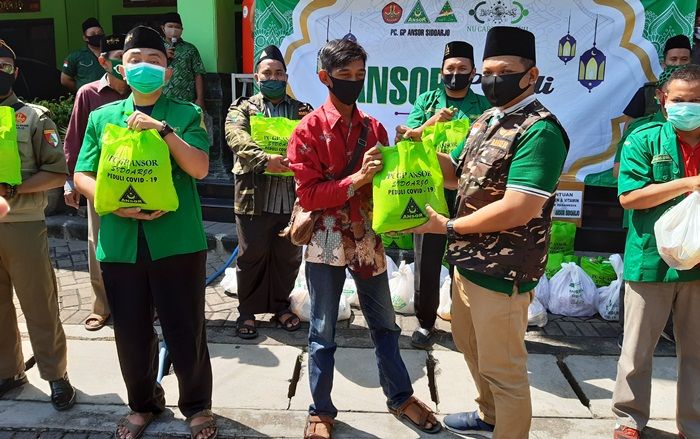 Peduli Profesi Terdampak Covid-19, GP Ansor Sidoarjo Salurkan 1.000 Sembako