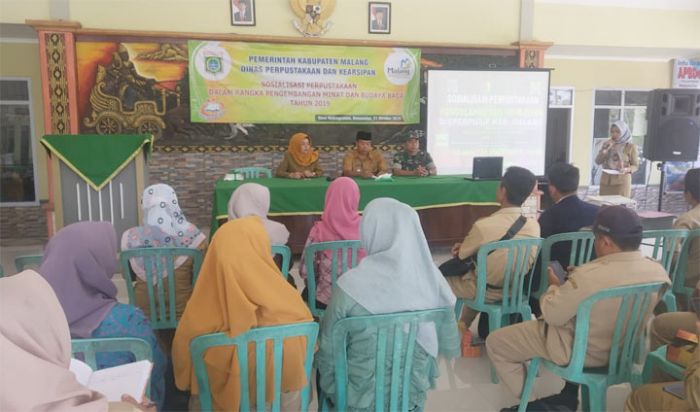 Dispusip Malang Gelar Sosialisasi Pengembangan Minat dan Budaya Baca di Lokasi TMMD 106 Dispusip Malang Gelar Sosialisasi Pengembangan Minat dan Budaya Baca di Lokasi TMMD 106