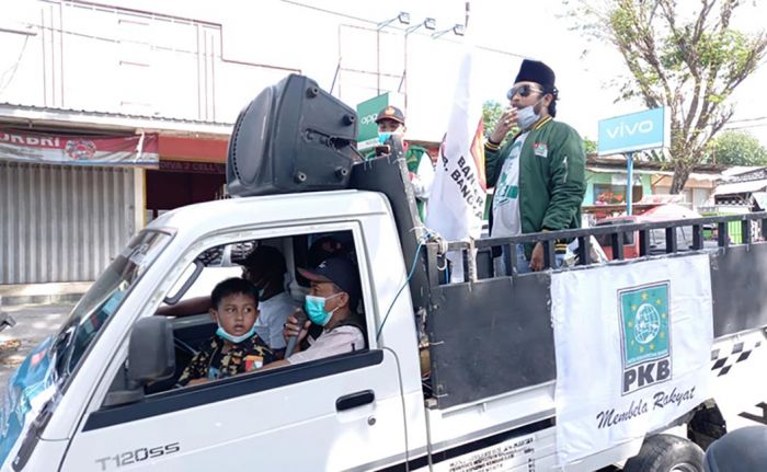 GP Ansor Kamal Sosialisasi dan Bagikan 1.500 Masker Gratis GP Ansor Kamal Sosialisasi dan Bagikan 1.500 Masker Gratis