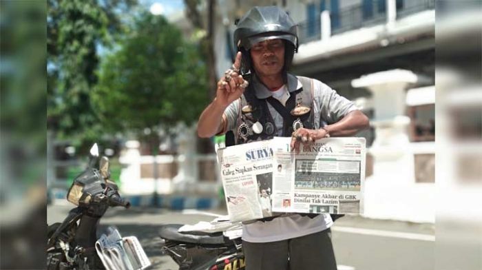 Loper Koran di Pacitan Coblos Jokowi Loper Koran di Pacitan Coblos Jokowi
