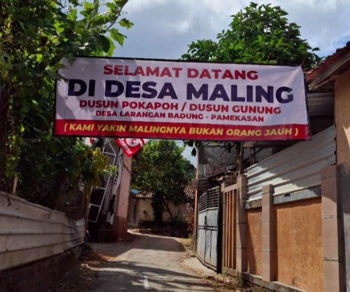 Resah Marak Pencurian, Warga di Pamekasan Pasang Spanduk Resah Marak Pencurian, Warga di Pamekasan Pasang Spanduk