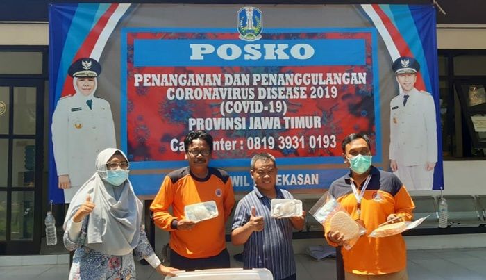 Peduli Kesehatan Relawan Covid-19, OPD dan IKM di Pamekasan Berikan Extra Fooding dan Jamu