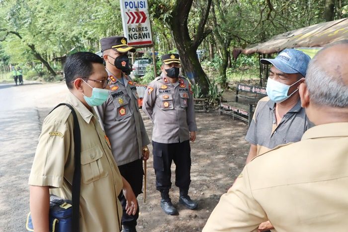 Antisipasi Penyebaran PMK, Polres Ngawi Dirikan Pos Penyekatan di Perbatasan Bojonegoro